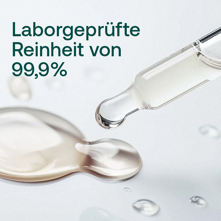 Nahaufnahme einer Pipette mit Flüssigkeit und Tropfen, laborgeprüfte Reinheit von 99,9% dargestellt